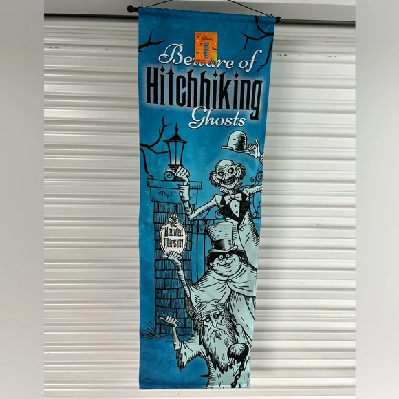 NWT 2023 DISNEY HAUNTED MANSION BEWARE OF HITCHHIKING GHOSTS HANGING BANNER - Picture 1 of 4